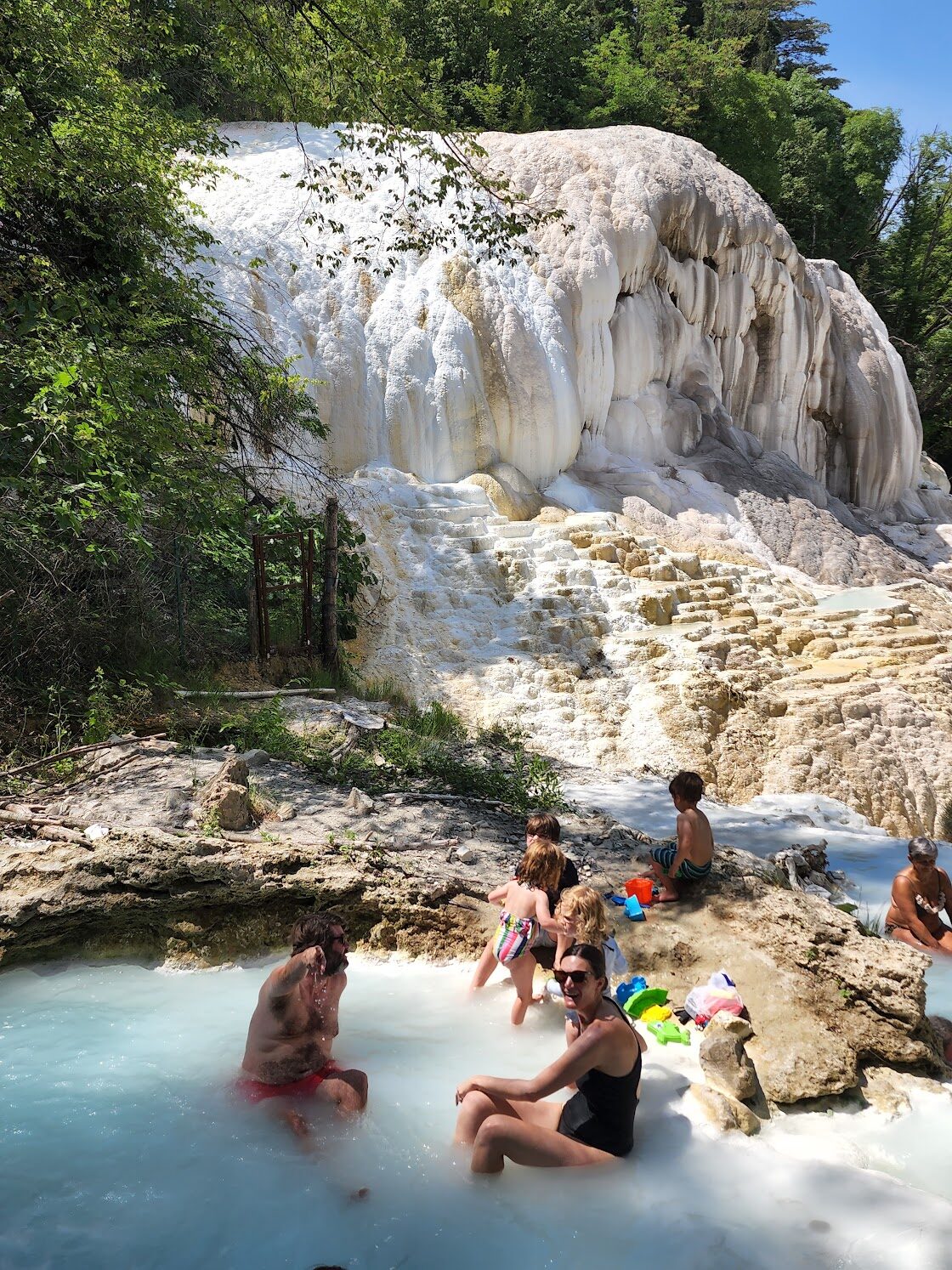 Bagni San Filippo is the best wild thermal spring day from Montepulciano if you want the natural setting more than polished facilities.