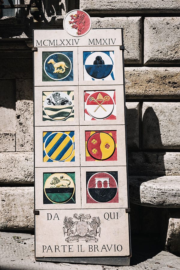 The Bravio delle Botti start marker with the eight contrade symbols. Photo courtesy of braviodellebotti.com. The Bravio delle Botti start marker with the eight contrade symbols. Photo courtesy of braviodellebotti.com.